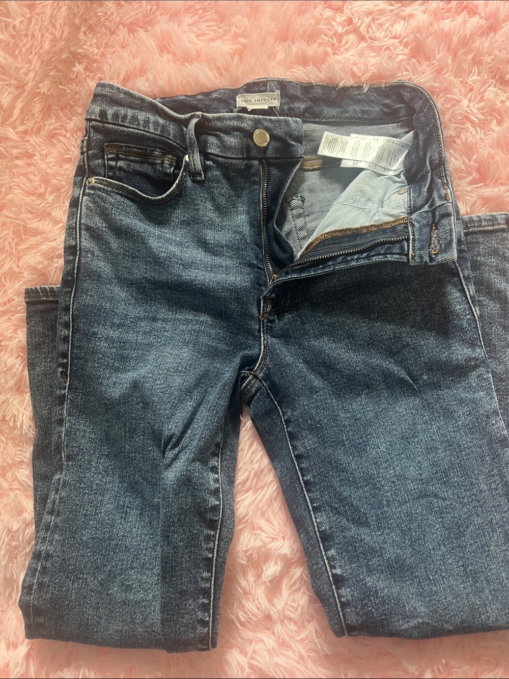 Good American medium wash straight jeans